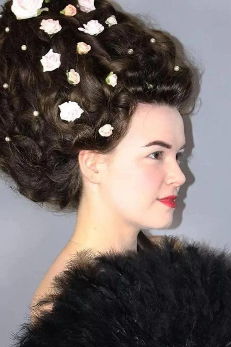 Girl in Period Makeup with Flower Wig