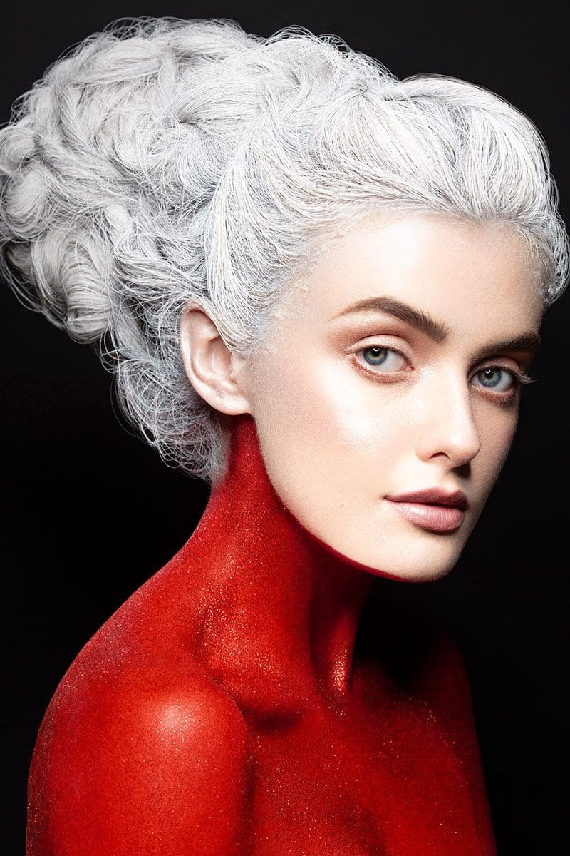 Girl with White Hair and Red Body Makeup