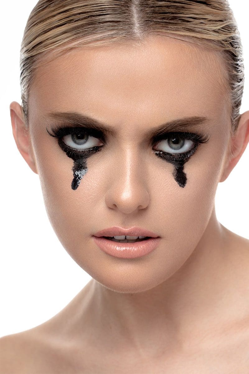 Girl with Dark Black Tear Makeup