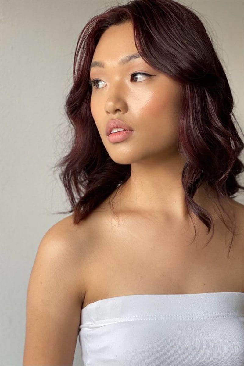 Girl with makeup looking right