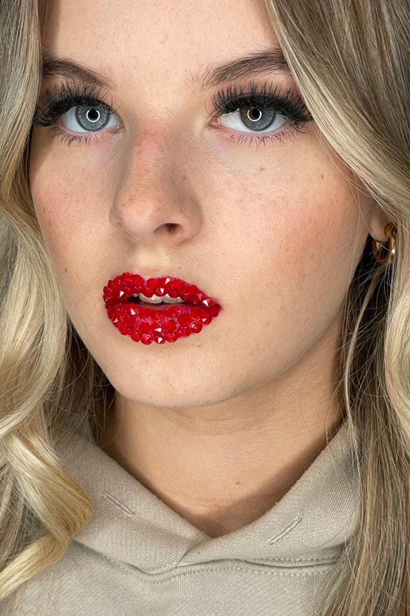 A makeup artist checking a look