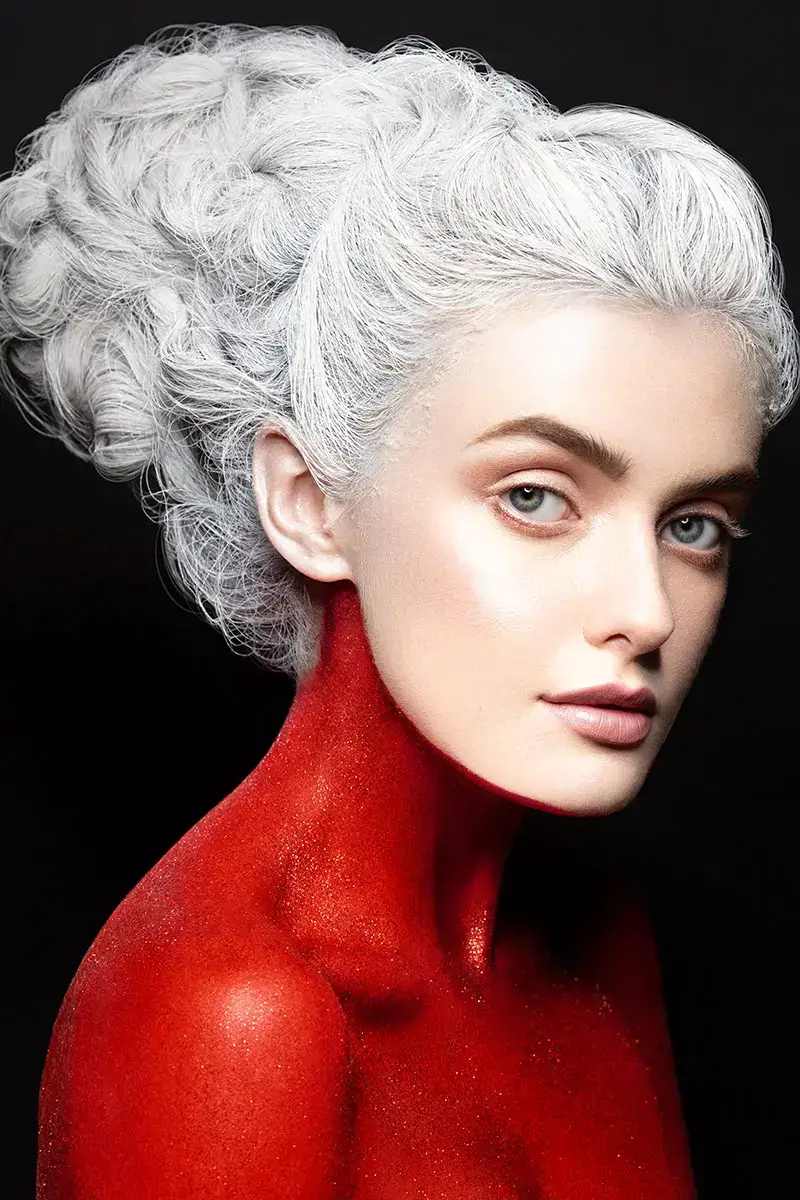 An elaborate avant-garde hair and makeup creation