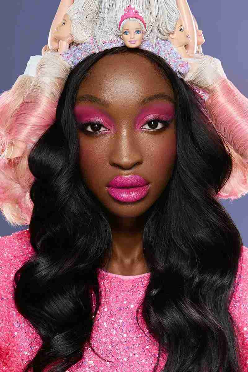 Girl with barbie doll headpiece makeup